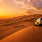Top 10 Dubai Desert Safari Packages with luxury 4x4, camel ride, and desert camp at sunset